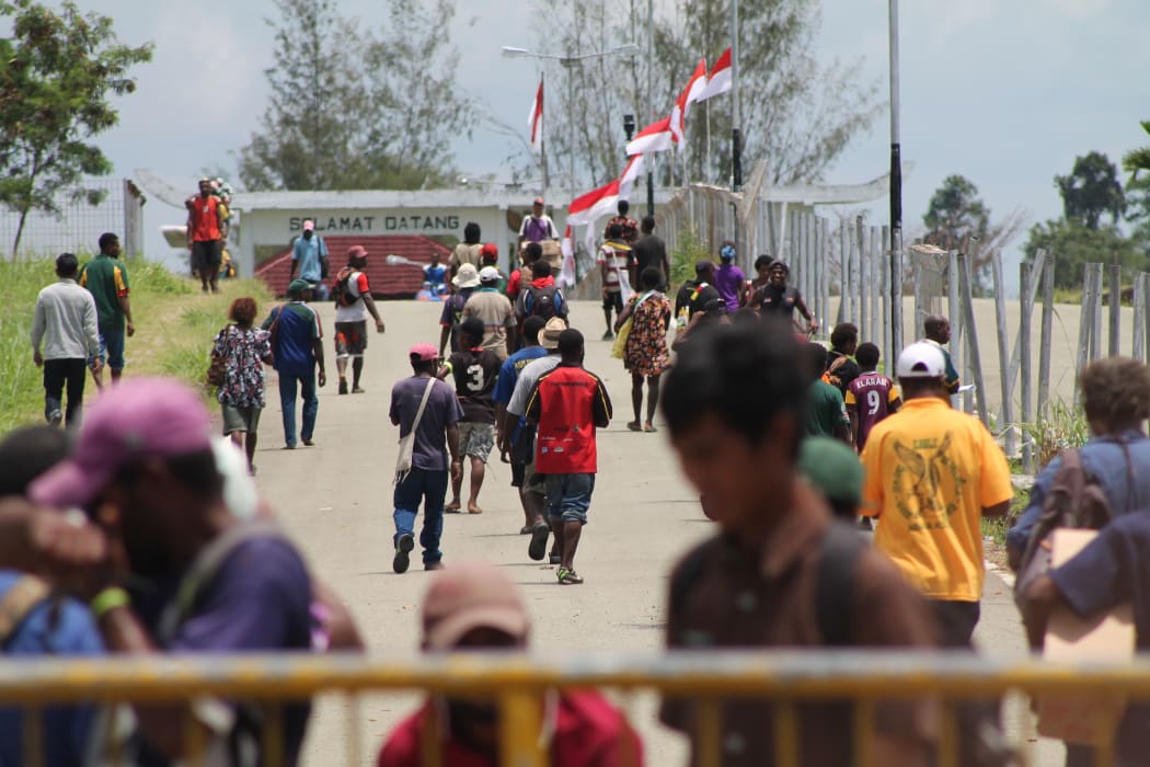 Papua New Guineans cross the Indonesian border for goods and services.