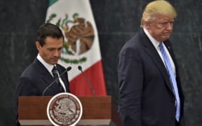 Enrique Pena Nieto and Donald Trump in August last year.