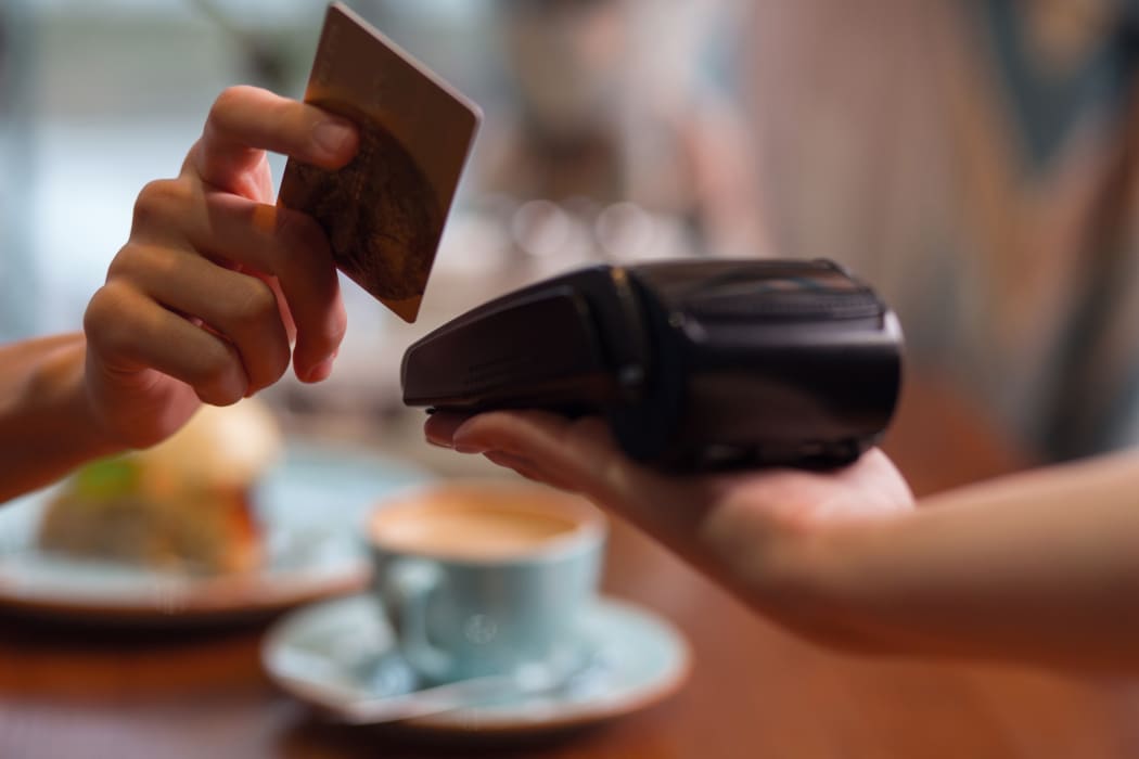 credit card swipe through terminal, spending, consumer confidence, retail, hospitality