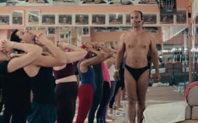 Still from the film "Bikram: Yogi, Guru, Predator"