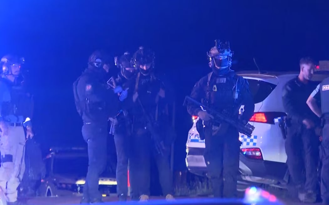 Armed police attend the incident in Sydney's inner-west on Sunday 5 October 2025