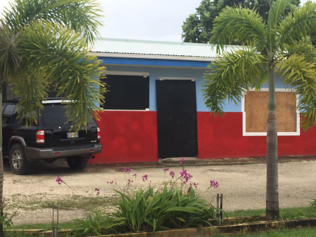 This house hase been boarded up in anticipation of Typhoon Yutu.