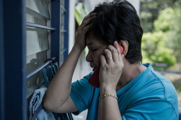 Sarah Nor, 55, the mother of 4-year-old Malaysia Airlines passenger Norliakmar Hamid, at her Kuala Lumpur home.