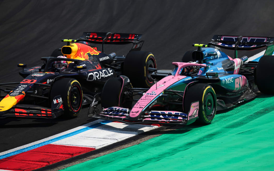 Liam Lawson (L) and Jack Doohan duel at the Chinese Grand Prix in Shanghai.