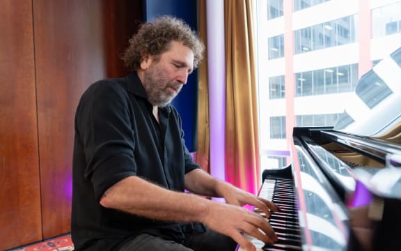 Conductor Asher Fisch at the piano