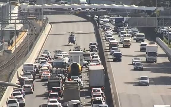 NZTA footage shows a helicopter landing in the area.