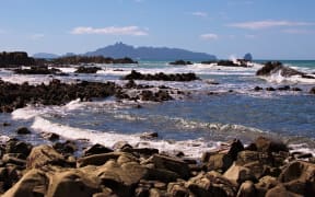 Mangawhai Heads with Taranga Island in the background.