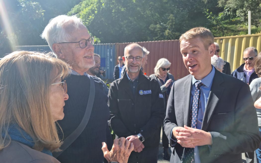Prime Minister Chris Hipkins speaks to Nelson residents John Roosen and Susan Rogers whose home was initially red stickered in the August weather event.