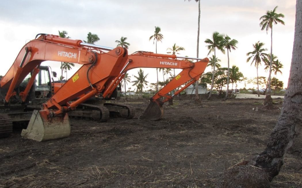 Diggers work on the site at Popua