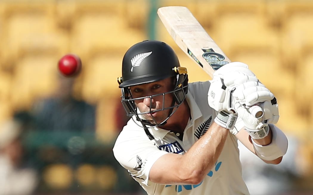 Will Young of New Zealand plays a shot.
