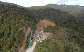 The gorge where State Highway 25A was destroyed still shows marks on the land.