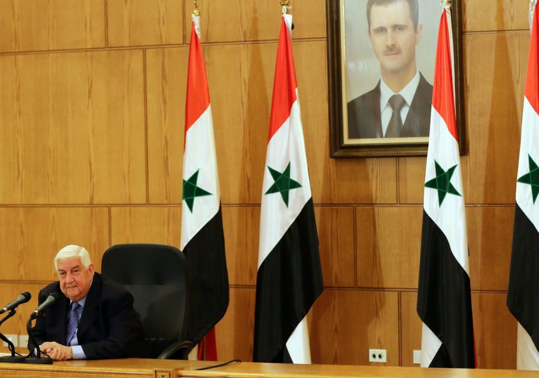 Syrian Foreign Minister Walid Muallem at a news conference on 12 March in Damascus ahead of the peace talks in Geneva.