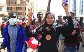 Sudanese rally against a military coup which occurred nearly three months ago, south of the capital Khartoum.