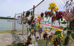 Memorial fence in Whakatāne after the Whaakari / White Island eruption.
