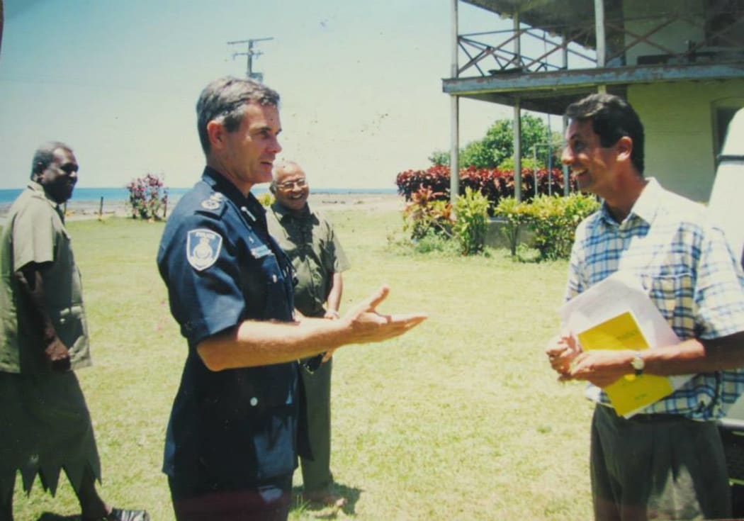 Andrew Hughes (left) in his role as Fiji Police Commissioner visits Cawaci where he meets Mr. Darren Koch (right) a fellow Australian who taught in Cawaci.