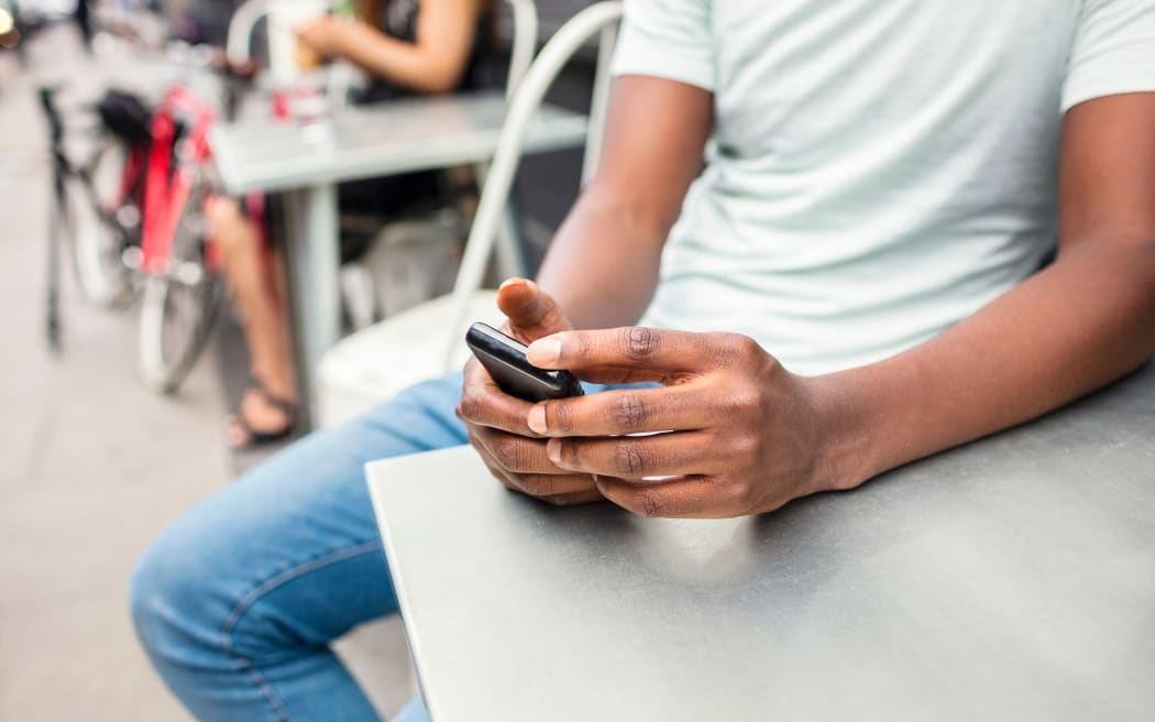 A man using a mobile phone