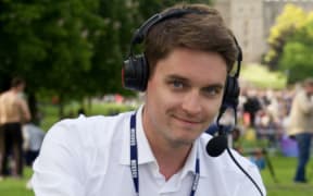 The BBC's Rich Preston with headset and script.
