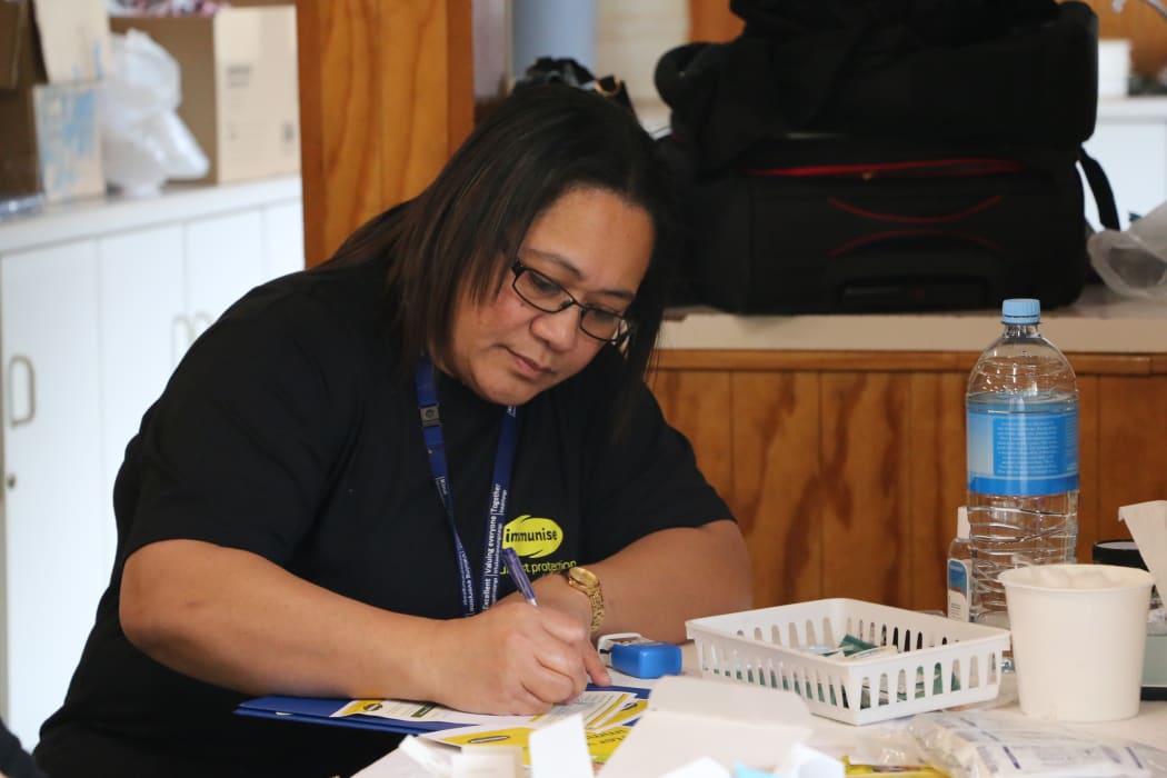 Community nurse Sita Moala working at the measles vaccination drop in centre at the Free Church of Tonga in Mangere today.