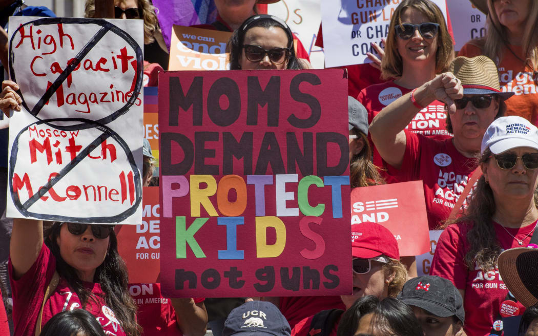 Protesters call for firearms control and protest against gun violence in the US after a string of high profile massacres across the nation, at a rally in Los Angeles on August 17, 2019.