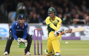 Glenn Maxwell reverse sweeps Moeen Ali during the second International between England and Australia at Lord's.
