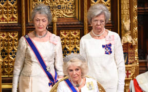 Britain's Camilla, Duchess of Cornwall (C) and Lady Susan Hussey (L), attend the State Opening of Parliament in the Houses of Parliament in London on October 14, 2019. - The State Opening of Parliament is where Queen Elizabeth II performs her ceremonial duty of informing parliament about the government's agenda for the coming year in a Queen's Speech. (Photo by Paul Edwards / POOL / AFP)