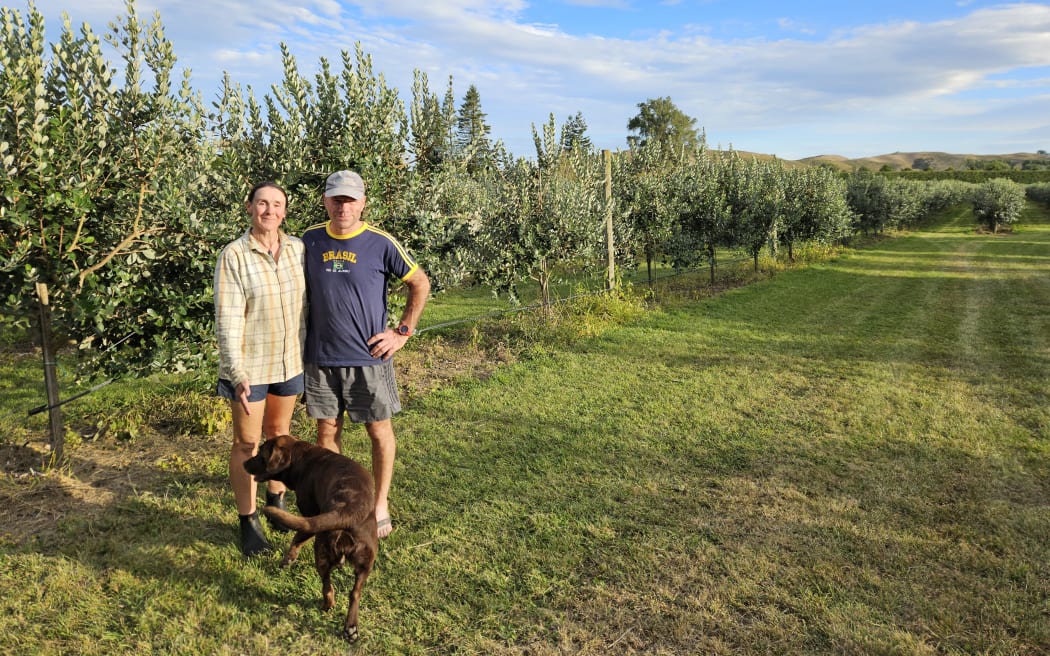 Philippa and Brent Fuller with their dog Kela.