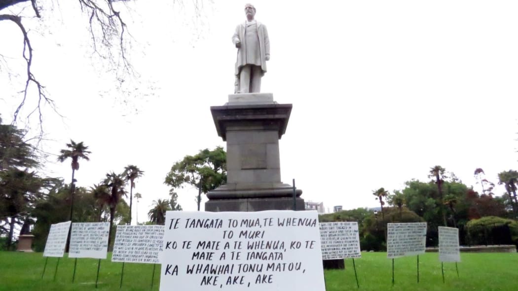 Placards about Parihaka on display in Albert Park.