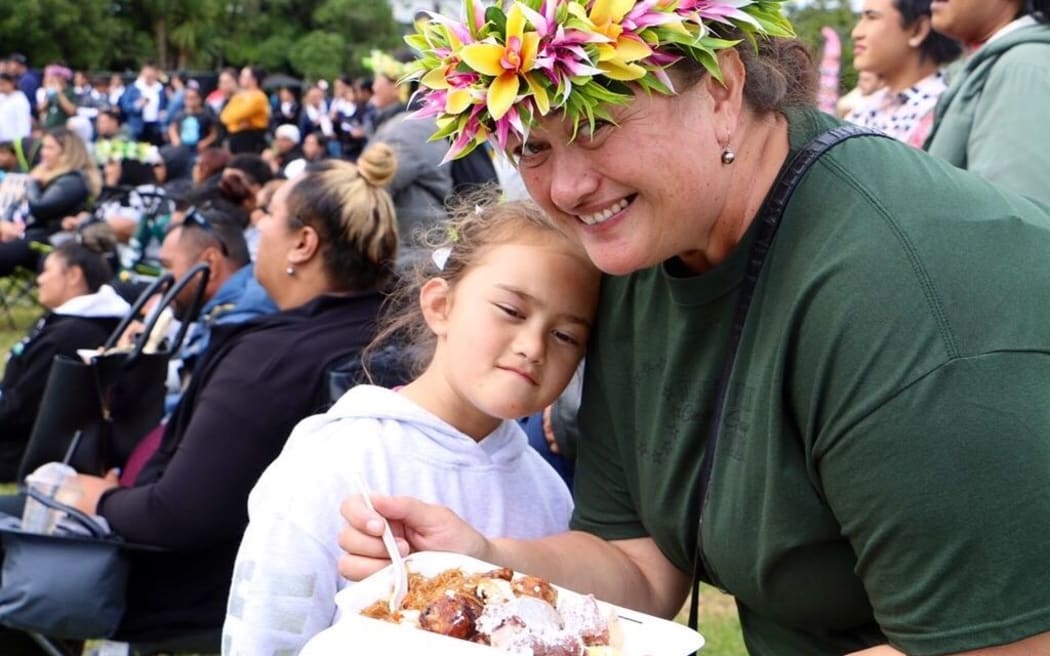 Manurewa High School tutor Ianny Pori, stops for a food break - day 2 Polyfest 2021