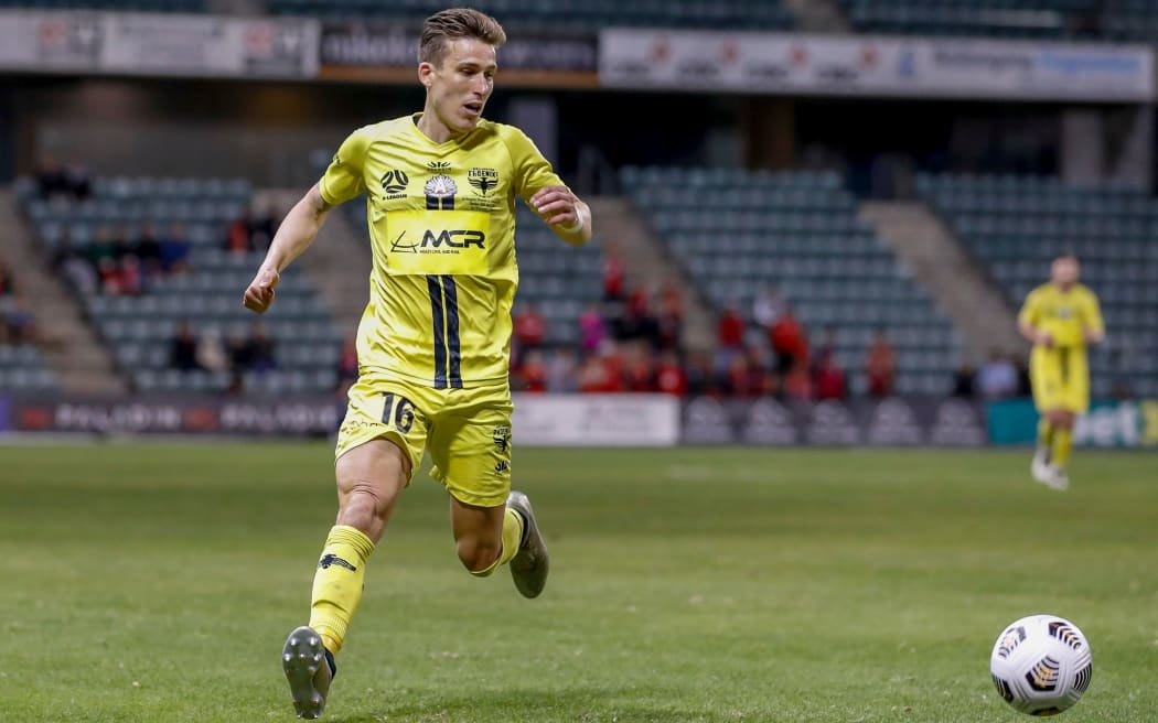 Louis Fenton of the Phoenix looks to maintain possession during the A-League match,  Wellington Phoenix v Adelaide United at WIN Stadium, Sunday 25th April 2021
