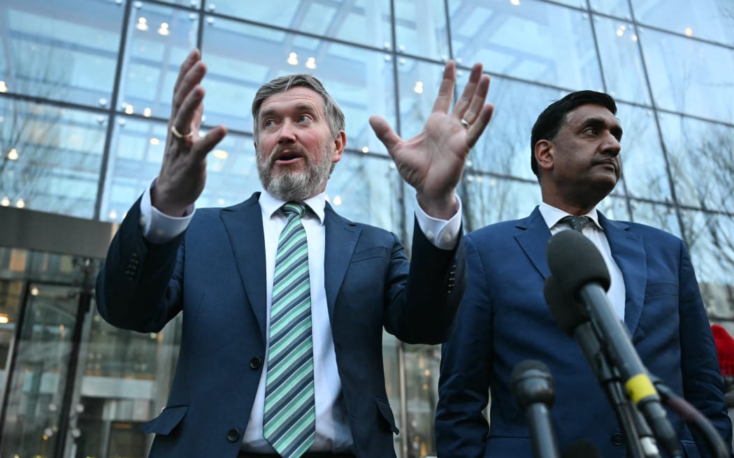 US Representatives Thomas Massie (L), Republican from Kentucky, and Ro Khanna, Democrat from California, speak outside the Department of Justice in Washington, DC, on February 9, 2026. Members of Congress will be allowed to review unredacted Jeffrey Epstein files on Department of Justice computers starting on February 9. (Photo by ANDREW CABALLERO-REYNOLDS / AFP)
