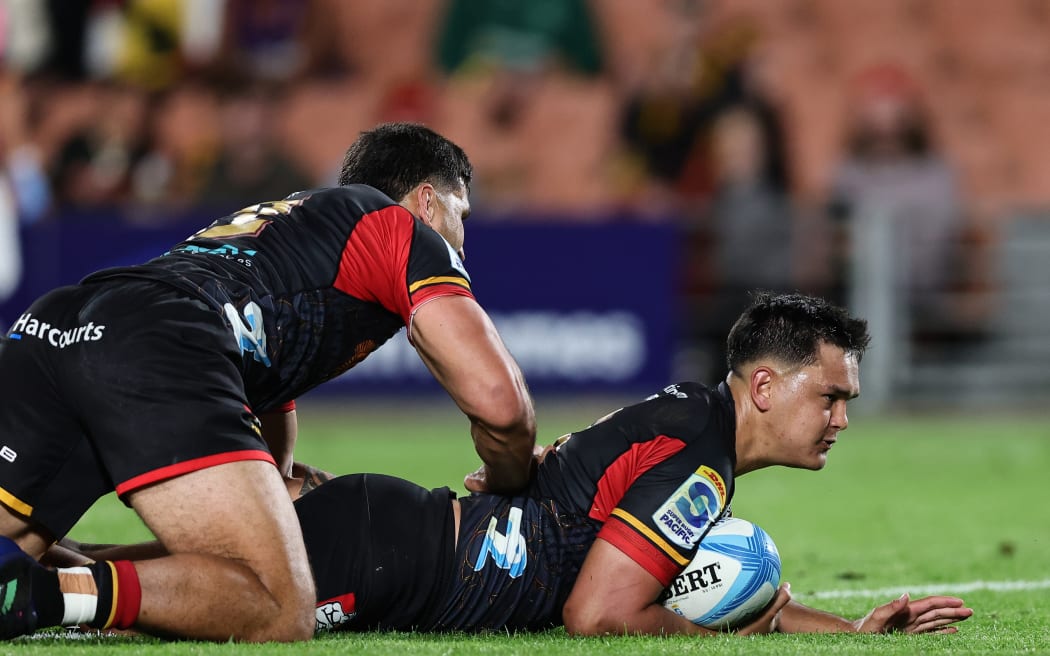 Daniel Rona scores a try for the Chiefs against Moana Pasifika at FMG Stadium in Hamilton.