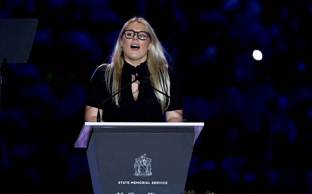 Shane Warne's daughter Brooke Warne speaks during the state memorial service for the former Australian cricketer Shane Warne at Melbourne Cricket Ground (MCG) in Melbourne on March 30, 2022. - Warne died at a resort in Thailand on March 4, of a heart attack at the age of 52. (Photo by William WEST / AFP)