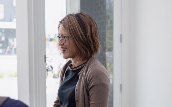 Meijing He, who works at Tātaki Auckland Unlimited, lost her job this month due to planned restructuring.