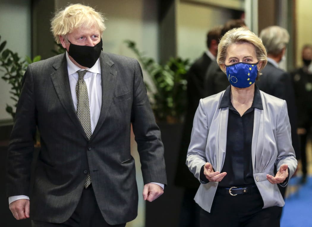 Britain's Prime Minister Boris Johnson is welcomed by European Commission President Ursula von der Leyen at the EU headquarters in Brussels.