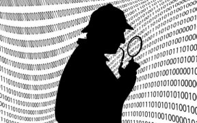 An image of Sherlock Homes with binary computer code in the background