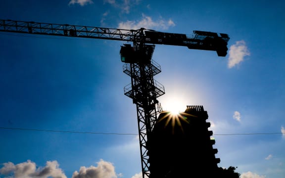 Cranes dot the skyline in Papua New Guinea's bustling capital Port Moresby.