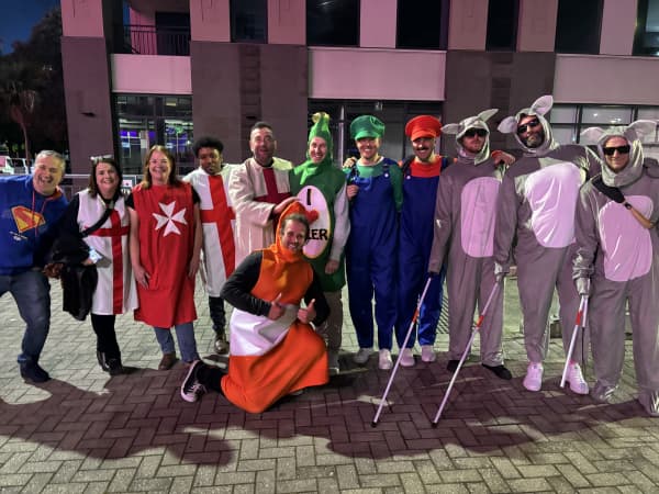 A large group of people in different costumes.