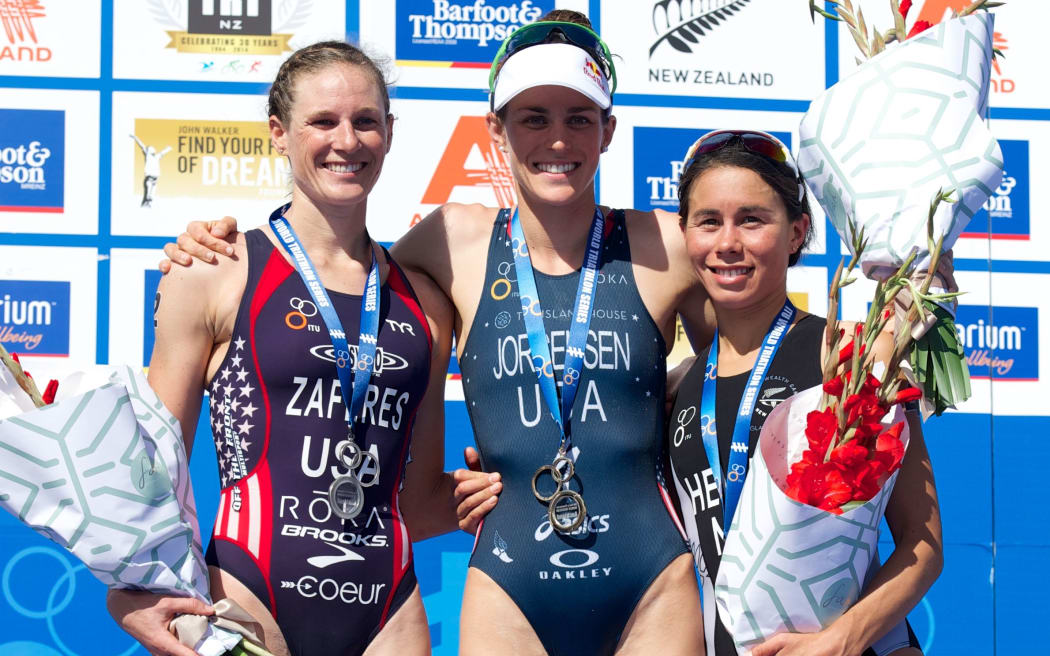 The women's podium from the 2015 Auckland triathlon, Katie Zaferes (2) Gwen Jorgensen (1), and Andrew Hewitt of New Zealand (3)