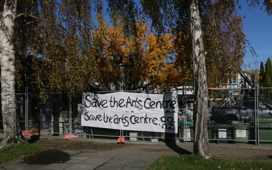 A 'Save the Arts Centre' banner hangs at the site of the original Dux de Lux building in central Christchurch