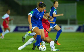 Samoa, in blue, on the attack against Tonga