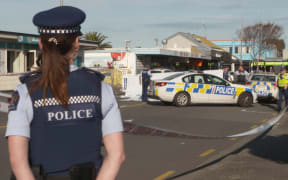 Police at the scene of a hit and run by a white van in New Brighton