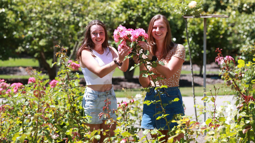 Marlborough Sounds residents Georgie Lightfoot, left, and Yske Hertoghs in the depleted rose gardens at Blenheim’s Pollard Park.