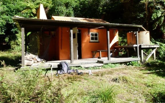 One of the Department of Conservation back country huts in Te Urewera given historic status within the department, Waiotukapiti Hut, is a rare totara-slab hut built in the 1950s by the Department of Internal Affairs as a base for deer cullers.