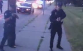 A screenshot from the Facebook video posted by the woman, after the police told her to get out of the car.