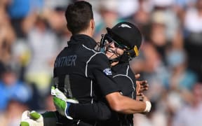 The Black Caps' Mitchell Santner celebrates with Tom Latham. First ODI vs Australia, Auckland, 2017.