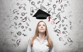 Woman considering education, stock photo.