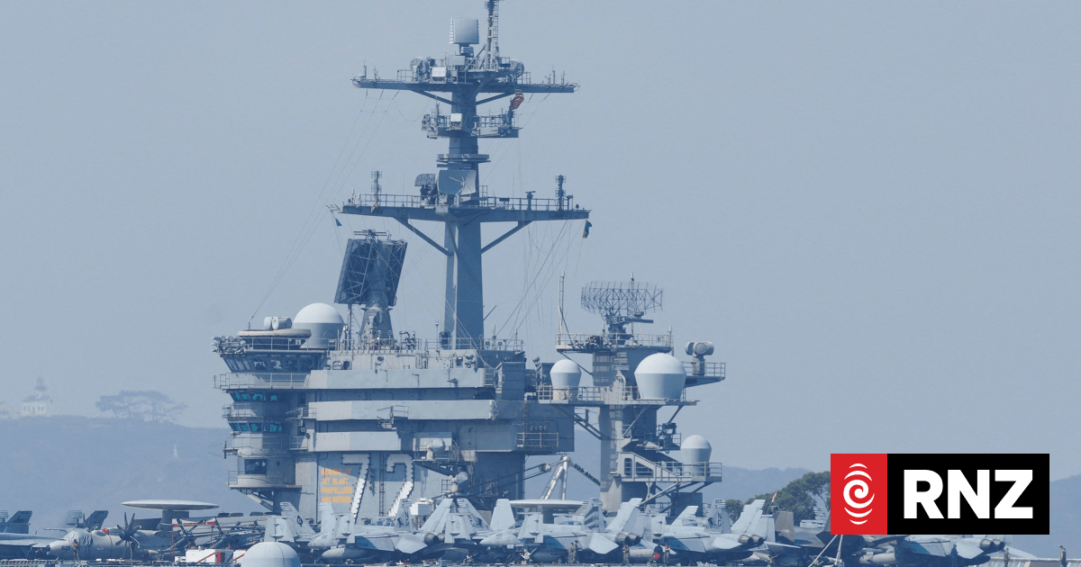 US carrier shoots down Iranian drone as tensions escalate