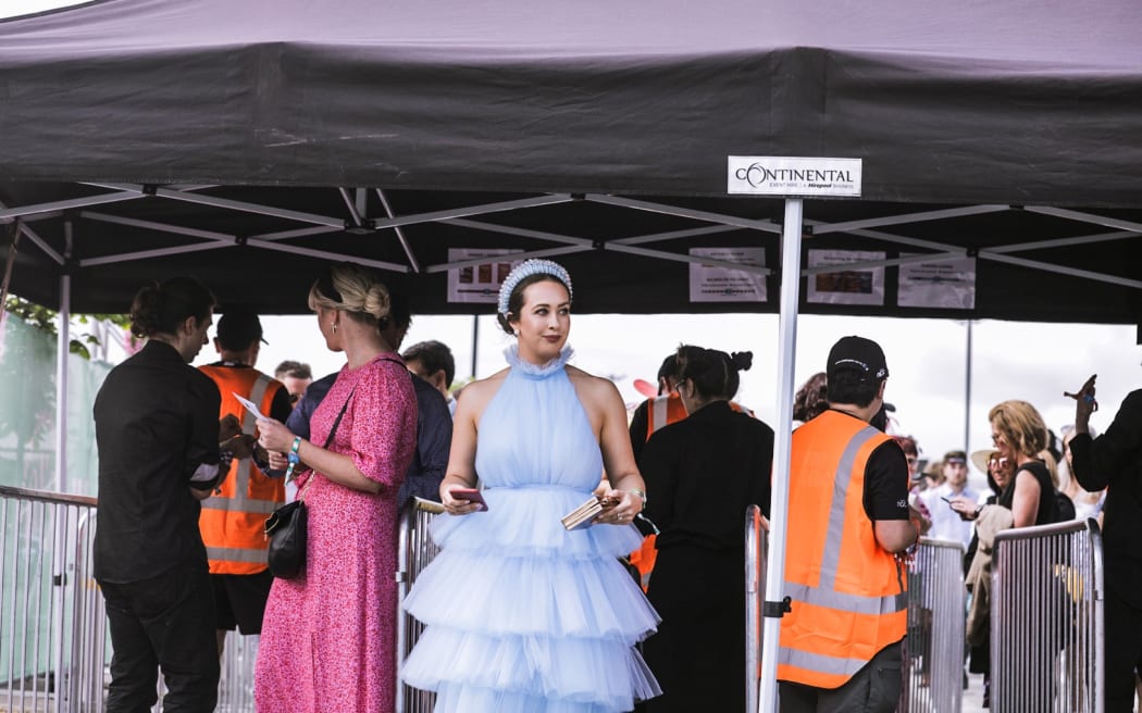 Crowds excited for New Zealand Trotting Cup at Addington Raceway in Christchurch.