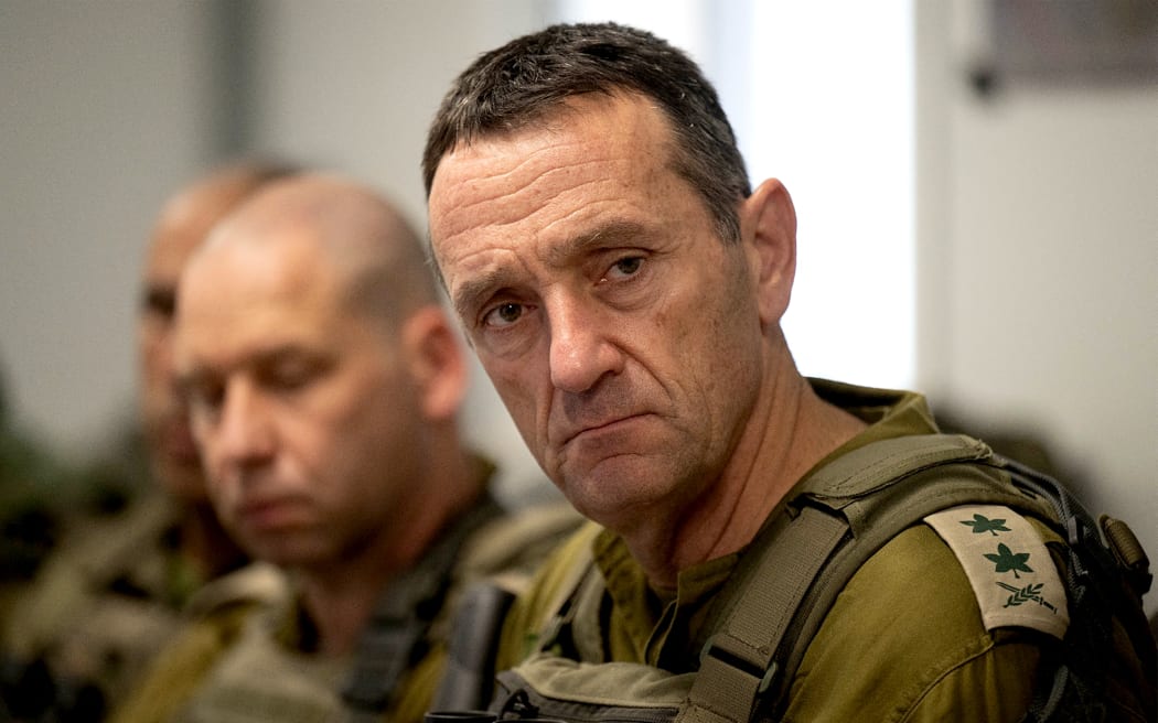 This handout picture released by the Israeli army on August 14, 2024 reportedly shows the Israeli Army Chief of General Staff Lieutenant-General Herzi Halevi (R) during a situational assessment at the Philadelphi Corridor in the Rafah area in the southern Gaza Strip. (Photo by Israeli Army / AFP) / === RESTRICTED TO EDITORIAL USE - MANDATORY CREDIT "AFP PHOTO / Handout / Israeli Army' - NO MARKETING NO ADVERTISING CAMPAIGNS - DISTRIBUTED AS A SERVICE TO CLIENTS ==