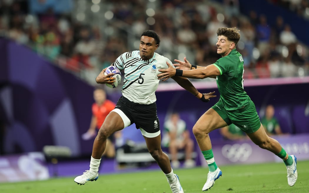 Fiji’s Iosefo Masi cuts through the defense for a try on day two of the Paris 2024 Olympic Games at Stade de France on 25 July, 2024 in Paris. Photo credit: Mike Lee - KLC fotos for World Rugby